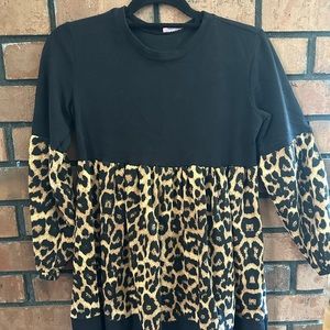 Boutique dress. Right above knee length. 3/4 sleeve. Worn once!